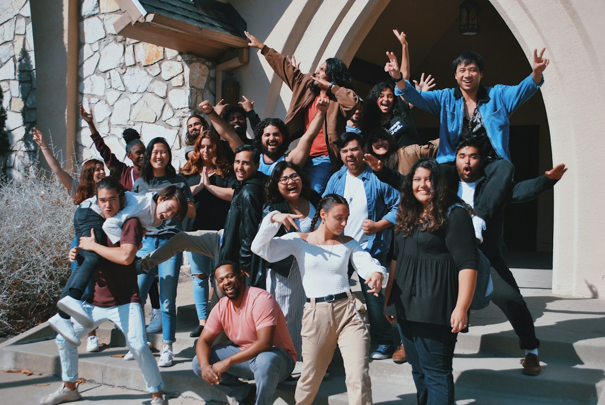 A joyful group of neighbors gathered on the church steps